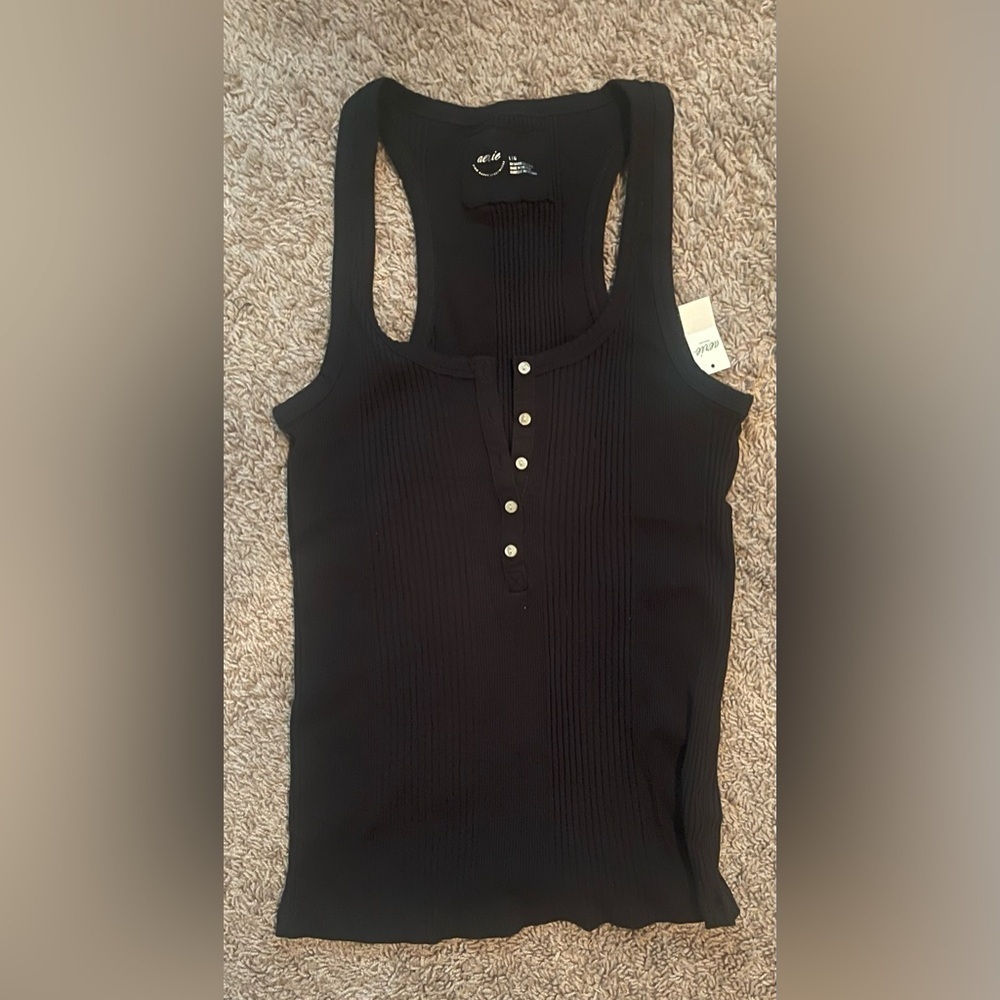 Arie
Womens size Large
NWT
Black and White tanks and leggings - Picture 4 of 4